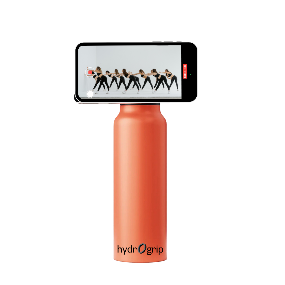 Bold orange insulated HydroGrip water bottle with MagSafe technology for phones.
