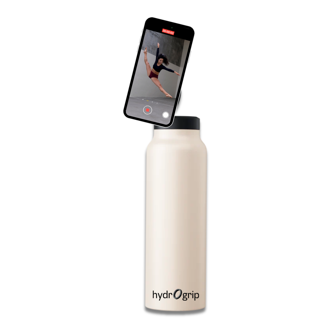 Elegant white insulated HydroGrip water bottle with MagSafe technology for phones.