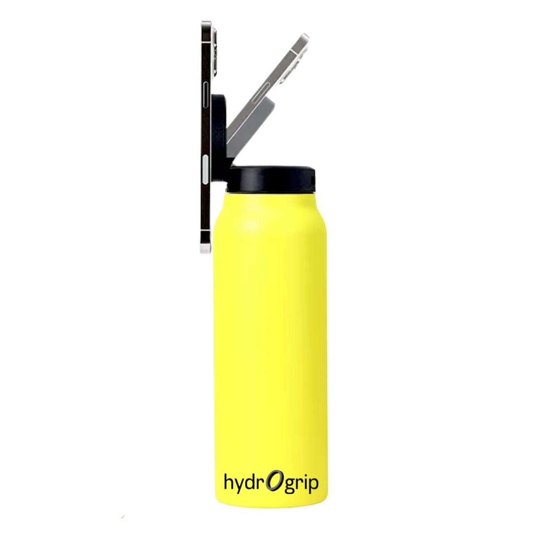 Hydrogrip Yellow Water Bottle with Phone Holder Holding a phone with a magnetic phone holder in 90 degrees. 